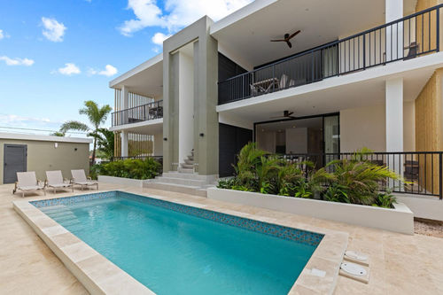 Últimas notícias da empresa sobre Projeto de Villas no Caribe: Melhorar a vida tropical com ventiladores de teto de madeira maciça